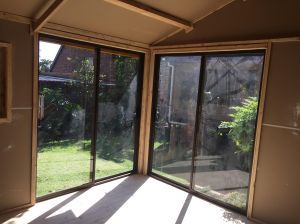 Log Unit Dry Walling and Sliding Doors from Inside